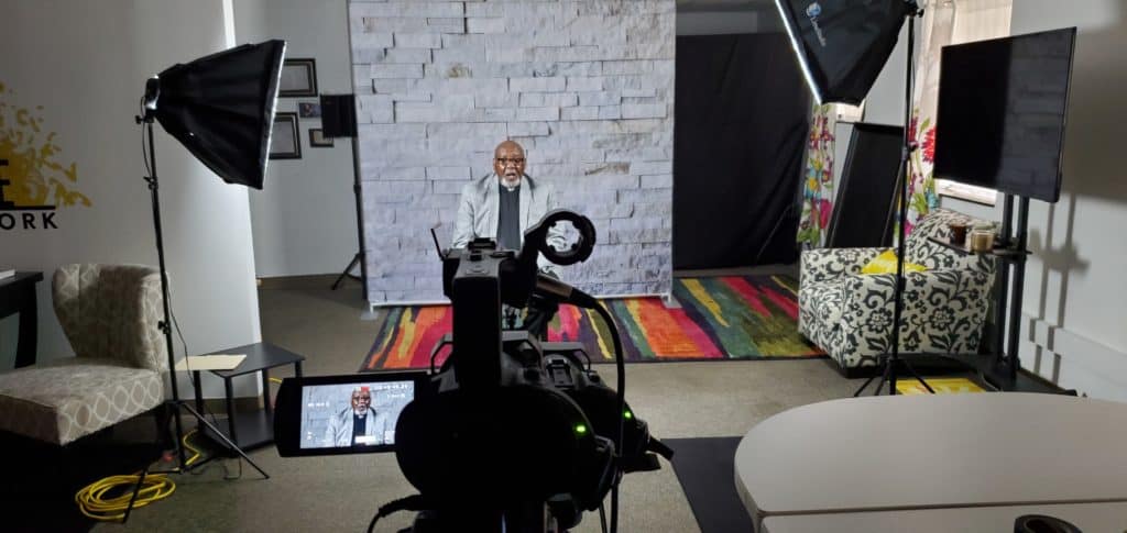 man using teleprompter